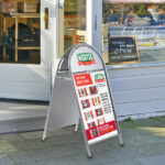 Rounded Logo Pavement Sign with Curved Header Panel